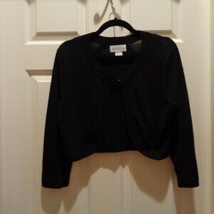 Dressy black shrug to finish off your evening wear! Timeless and classic